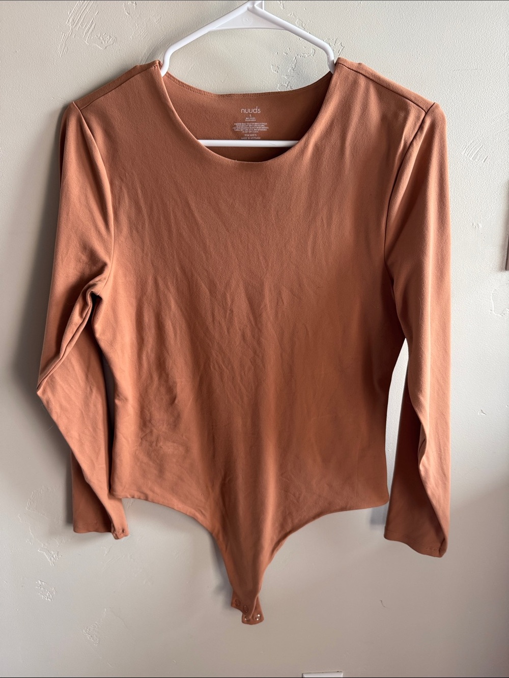 Nuuds long sleeve crewneck bodysuit color clay, size large.